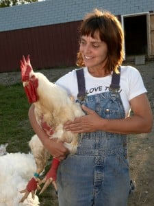 Susie Coston with a rescued rooster